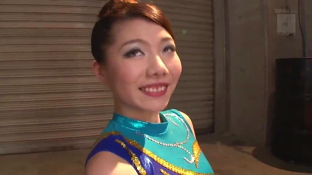 Flexible Japanese Gymnast Bends Over, Wears Shiny Leotard While Blowing Him