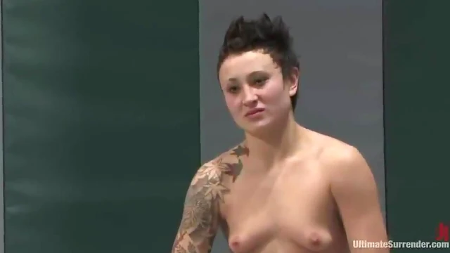 Sensual Tattooed Wrestler Toys Her Lover Amidst Ring Action Heat