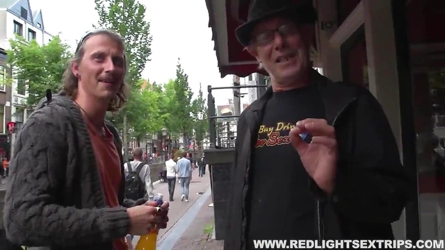 Men Dive Into Red Light District Seeking Hot Hookup With Seductive Escort