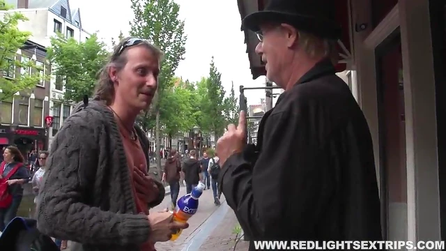 Men Dive Into Red Light District Seeking Hot Hookup With Seductive Escort