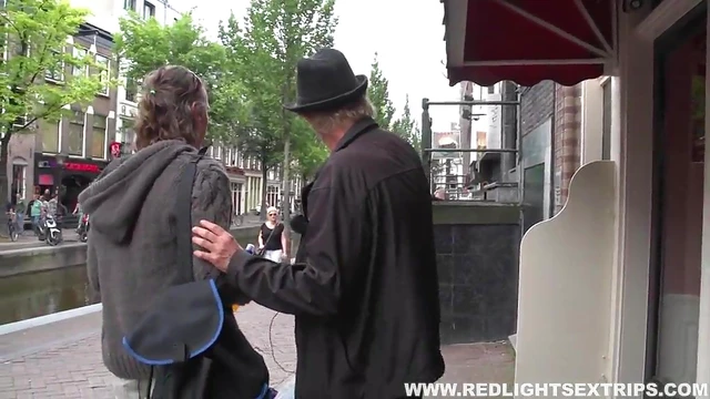 Men Dive Into Red Light District Seeking Hot Hookup With Seductive Escort