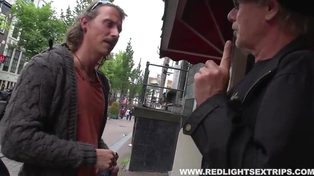 Men Dive Into Red Light District Seeking Hot Hookup With Seductive Escort