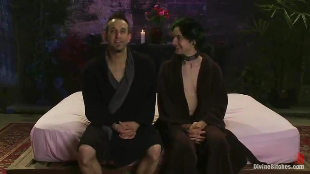 Bonded Man Endures Strap-On Pleasure from Two Dominating Women Masters