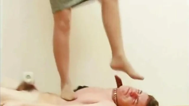 Mistress in Sexy Black Leather Boots Crushes Him Underfoot