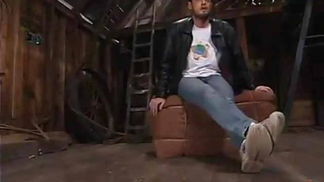 Sizzling Busty Brunette Mistress Toys Submissive Guy from Behind