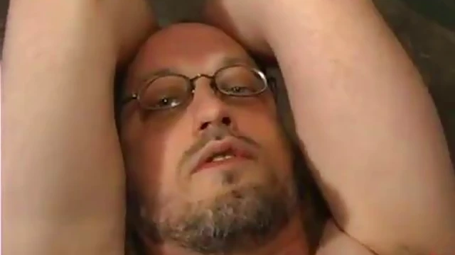 Sizzling Busty Brunette Mistress Toys Submissive Guy from Behind