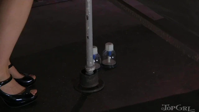 Rope-bound Redhead Gets Rough Spanking from Dominant Mistress