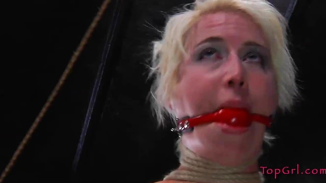 Bound Blonde Submits to Dominant Brunette's Kinky Desires