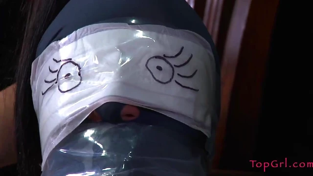 Masked Slave Submits to Torture Under Her Dominatrix's Firm Hand