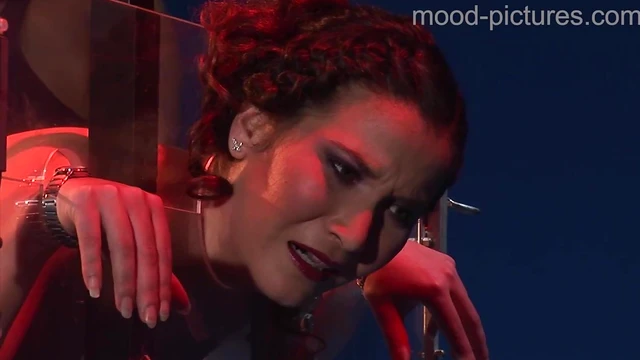 Submissive Brunette Takes Punishment from Dominating Mistress's Whip