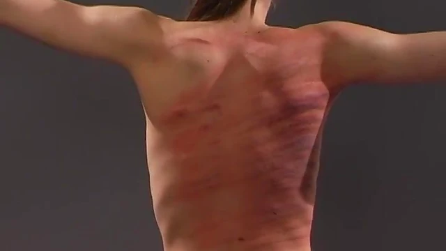 Submissive Brunette Gets Whipped On Her Back While Tied Up Seductively