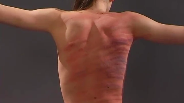 Submissive Brunette Gets Whipped On Her Back While Tied Up Seductively