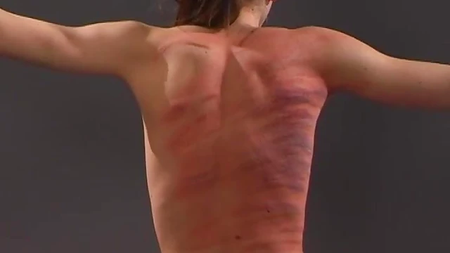 Submissive Brunette Gets Whipped On Her Back While Tied Up Seductively