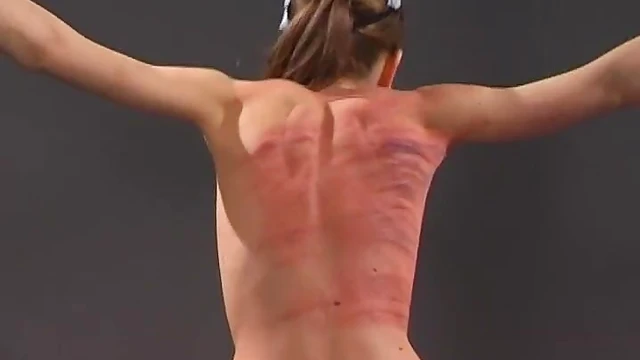 Submissive Brunette Gets Whipped On Her Back While Tied Up Seductively