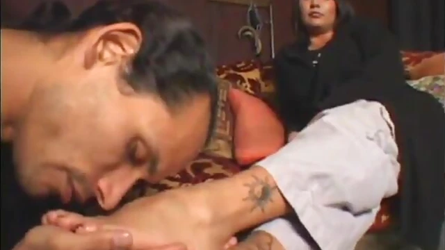Hot Michelle Teases Guy by Rubbing His Face with Her Feet Seductively