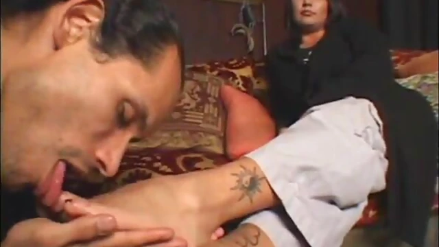 Hot Michelle Teases Guy by Rubbing His Face with Her Feet Seductively