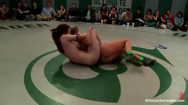 Striking Nudes Wrestle Passionately in Ring Showdown Thrills