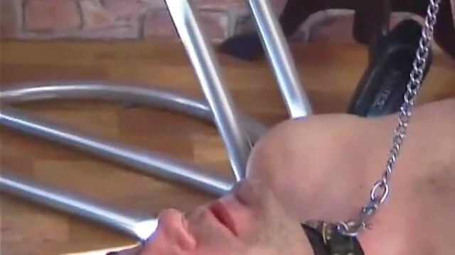 Domina Gerda Crushes Her Slave Underfoot in Humiliating Punishment