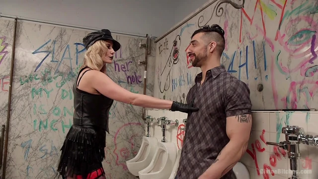 Tied Dude Awaits Punishing Whip Slaps from Mistress Madeline Marlowe's Hand