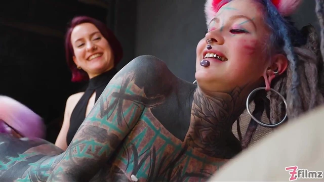 Tattooed Cat-Girl Submits Fully Under Dominatrix's Commanding Whip