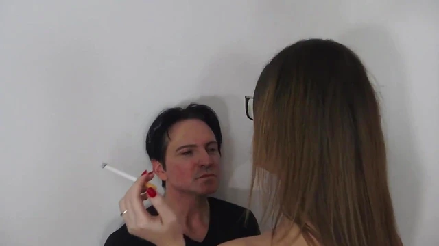 Tempting Tall Mistress Uses Ashtray During Steamy Domination Scene