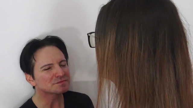 Tempting Tall Mistress Uses Ashtray During Steamy Domination Scene