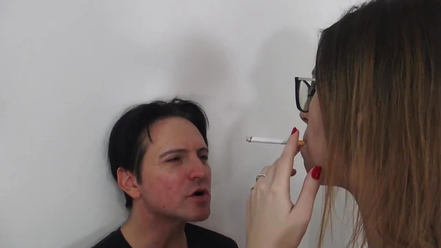 Tempting Tall Mistress Uses Ashtray During Steamy Domination Scene