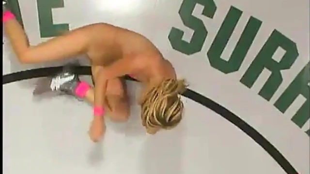 Redhead Dominates Blonde Chick in Steamy Bedroom Showdown