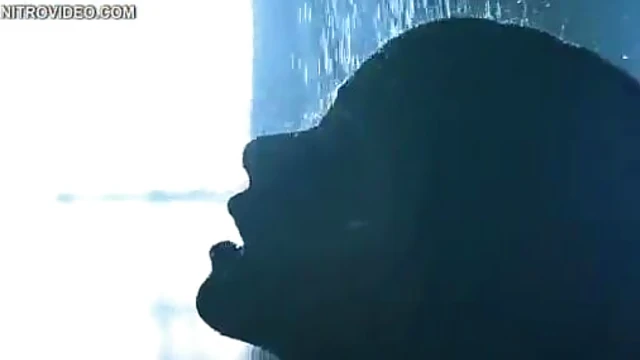 Sensual Halle Berry Loses It Under Pouring Water's Steamy Temptation