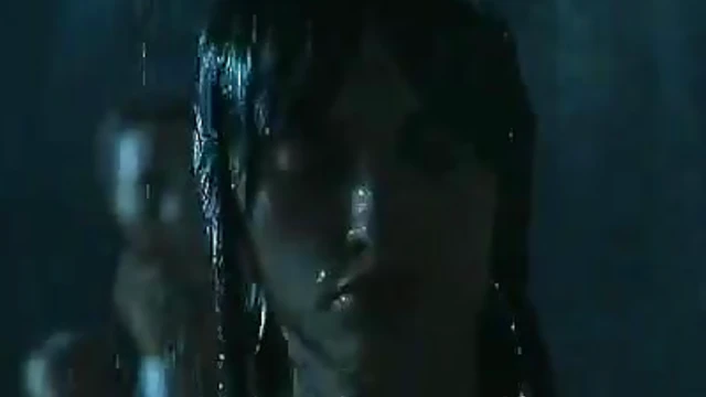 Sensual Halle Berry Loses It Under Pouring Water's Steamy Temptation