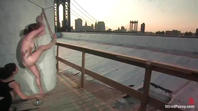 Outdoor Lesbian Bondage Showcases Stunning Urban Views & Passionate Sex Acts