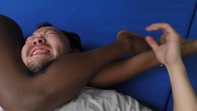 Ebony Goddess Dominates White Victim in Rough Bedtime Wrestle Match