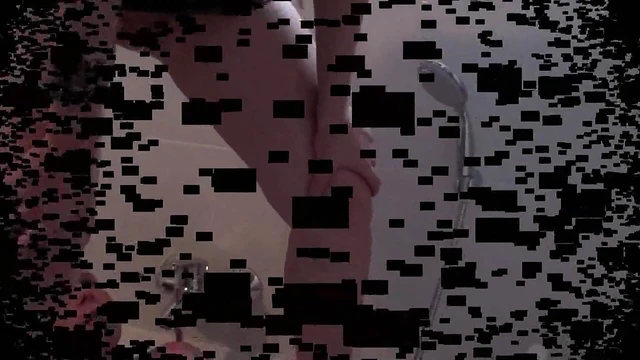 Hot Domme Pisses Over Submissive Slave's Face During Bath Time