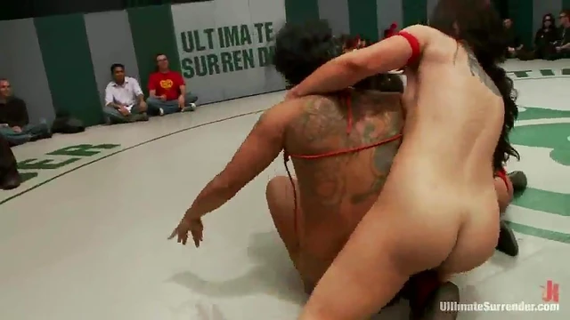 Sizzling Brunettes Wrestle Ring-Side While Teasing Each Other's Bodies