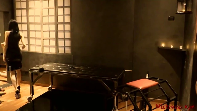 Dominant Mistress Whips Submissive Slave Sensually