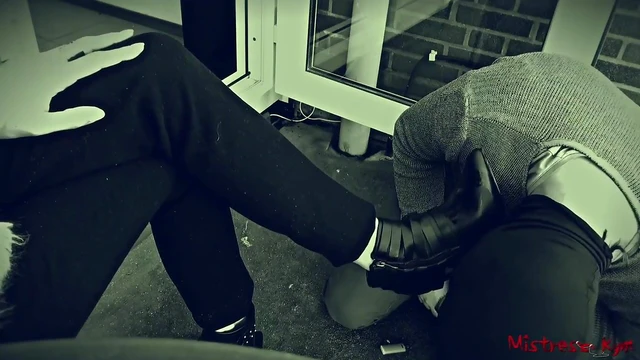 Submissive Shoe Worshipper Licks Mistress's High Heels Passionately