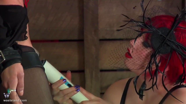 Bound Blindfolded Slave Submits to Mistress's Torturous Domination