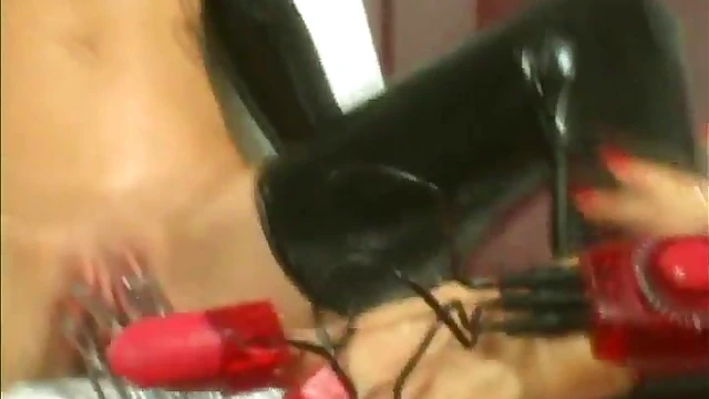 Masked Lesbians in Leather Engage in Kinky Sex Games Together