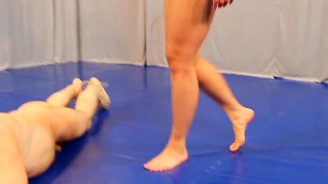 Femdom Mistress Wields Umbrella for Domination and Pleasure Ritual