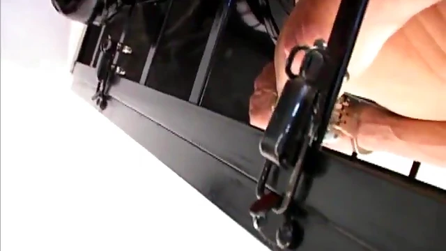 Dominant Mistress Roughly Humiliates Submissive Slaves in BDSM Ritual