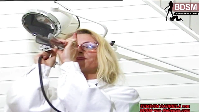 Domme Instructs Submissive Slave During German BDSM Encounter