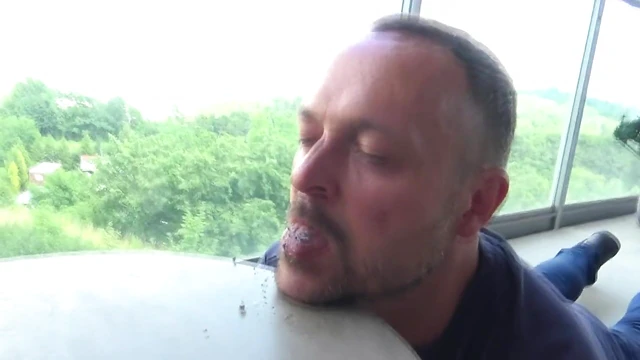 Human Ashtray Submits Fully, Devouring Cigarette Butts Intensely