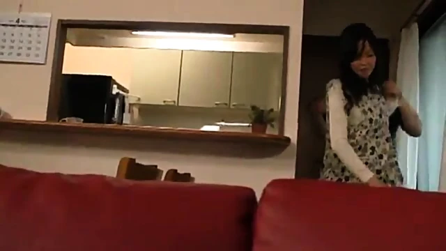 Mature Asian Woman Delivers Passionate Hardcore Sex On Red Couch