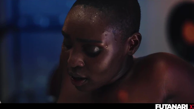 Curvy Black Beauty Takes Two Hard Dicks Simultaneously with Hot Futanari Action