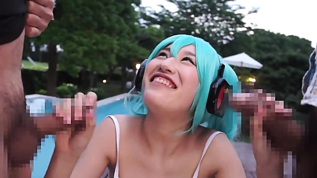 Blue-Haired Japanese Cosplayer Blows Two Guys Simultaneously In Hot Action