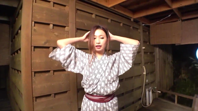 Sizzling Busty Japanese Milf Showcases Her Curves in Seductive Scene