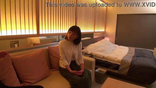 Hot Busty Japanese MILF Reveals Her Treasures in Sensual Video Clip
