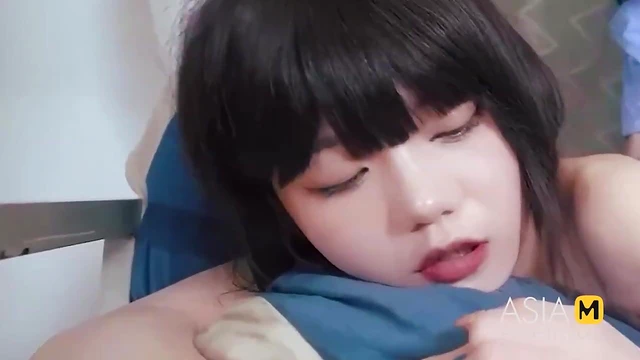 Asian Goddess Seduces While Wearing Sultry High Heels