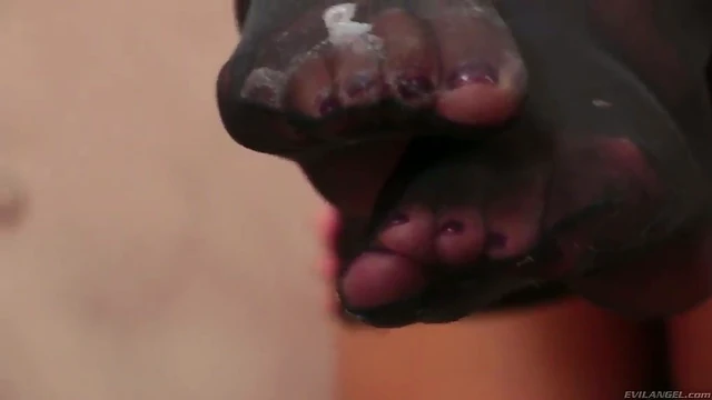 Sensuous Black Babe Teases With Nyloned Feet Before Self-Pleasure Showdown
