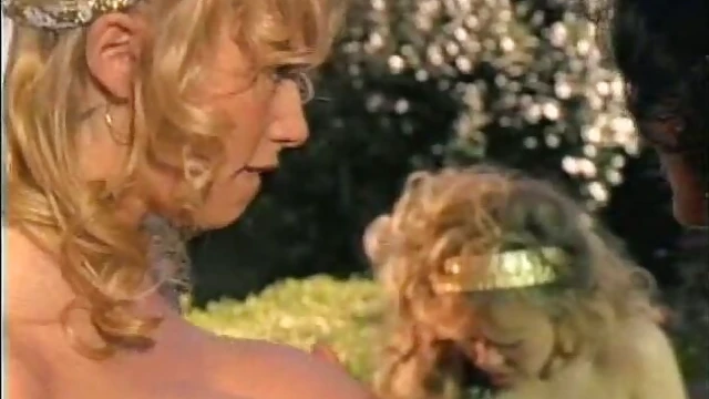 Curious Blonde Peeks at Stunning Lesbians' Passionate Garden Encounter